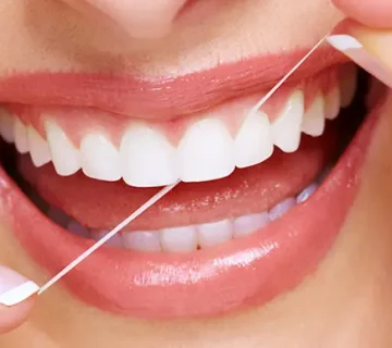 استفاده از نخ دندان برای مراقبت های قبل و بعد از عصب کشی دندان 4586451